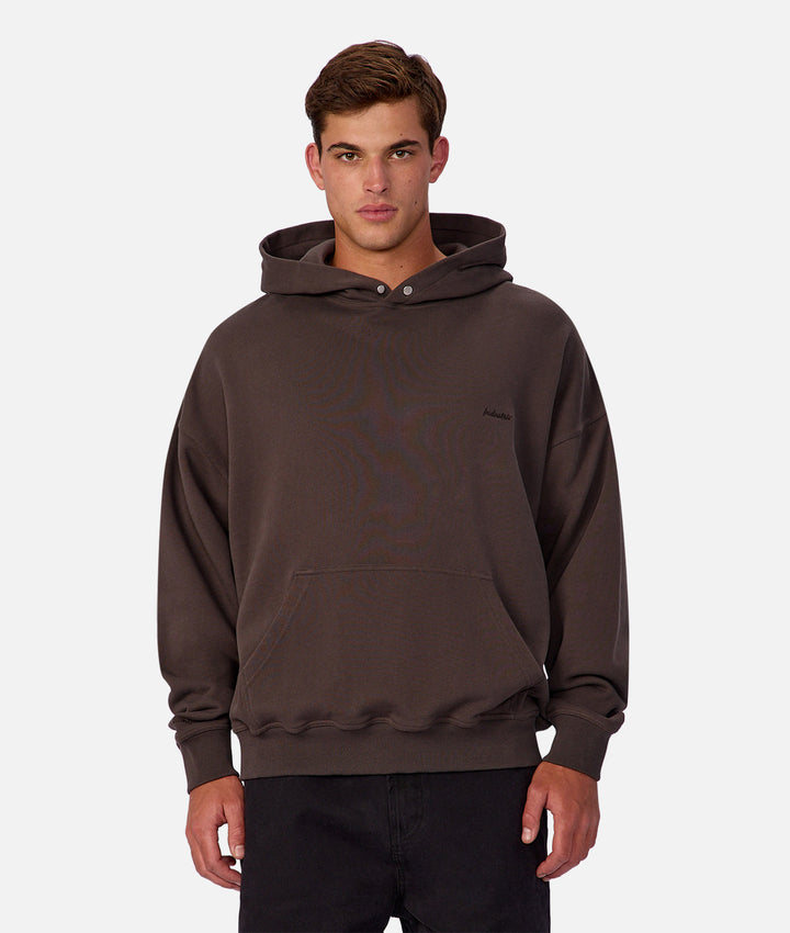 Man wearing a brown hoodie on a white background