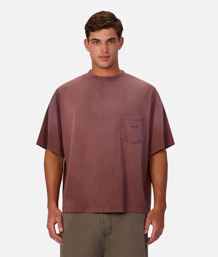 Man wearing a brown t-shirt on a white background